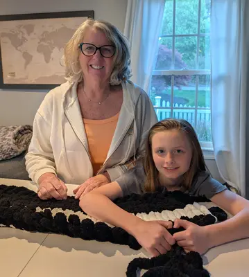 Photo of Laurie Reed, the knitter and heart behind Nanny Knits